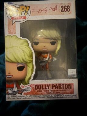 Funko Dolly Parton Vinyl Figure - Blonde with Orange Outfit and Silver Guitar